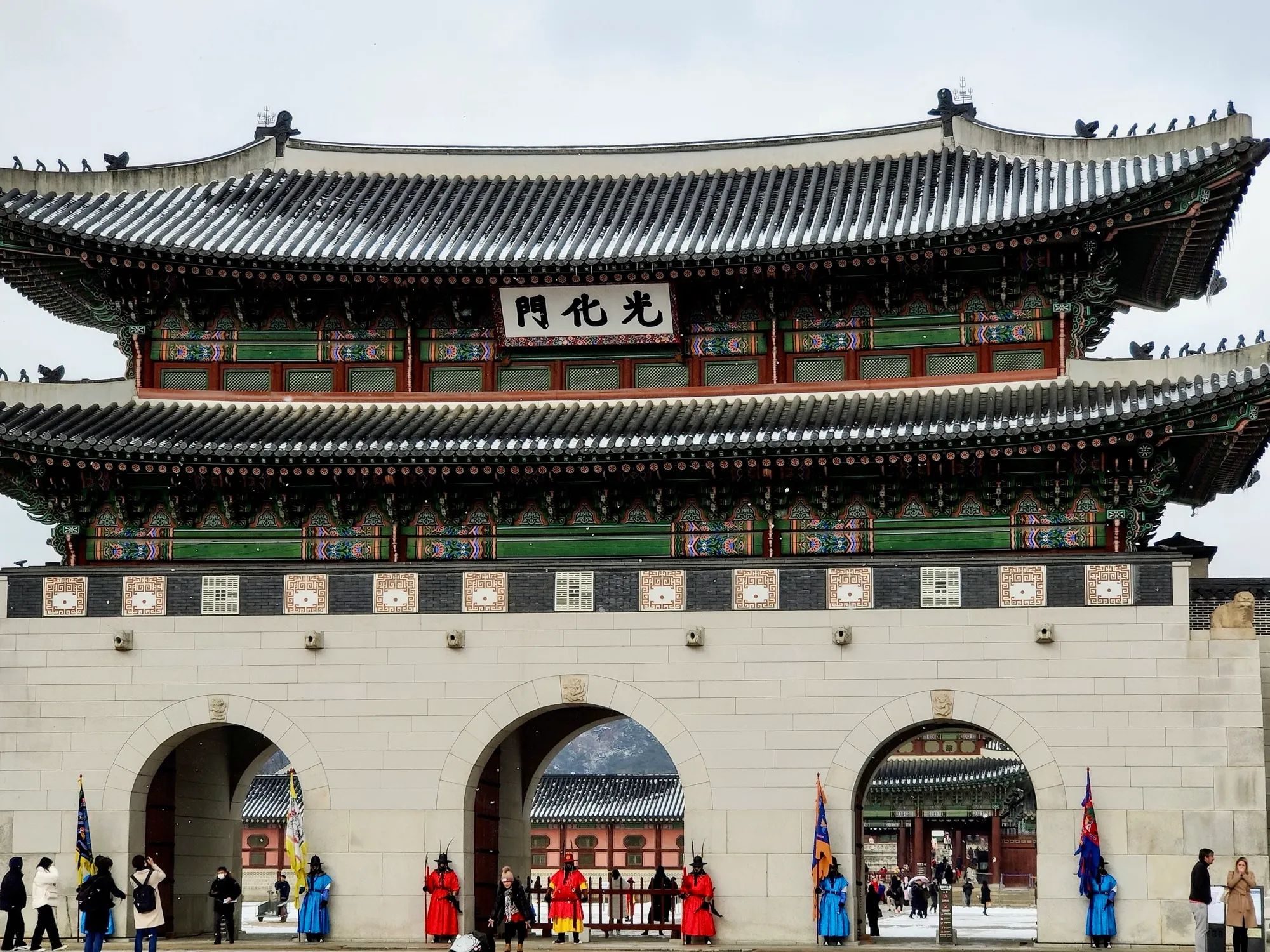 The gate of Gyeongbokgung palace on a clear winter day.