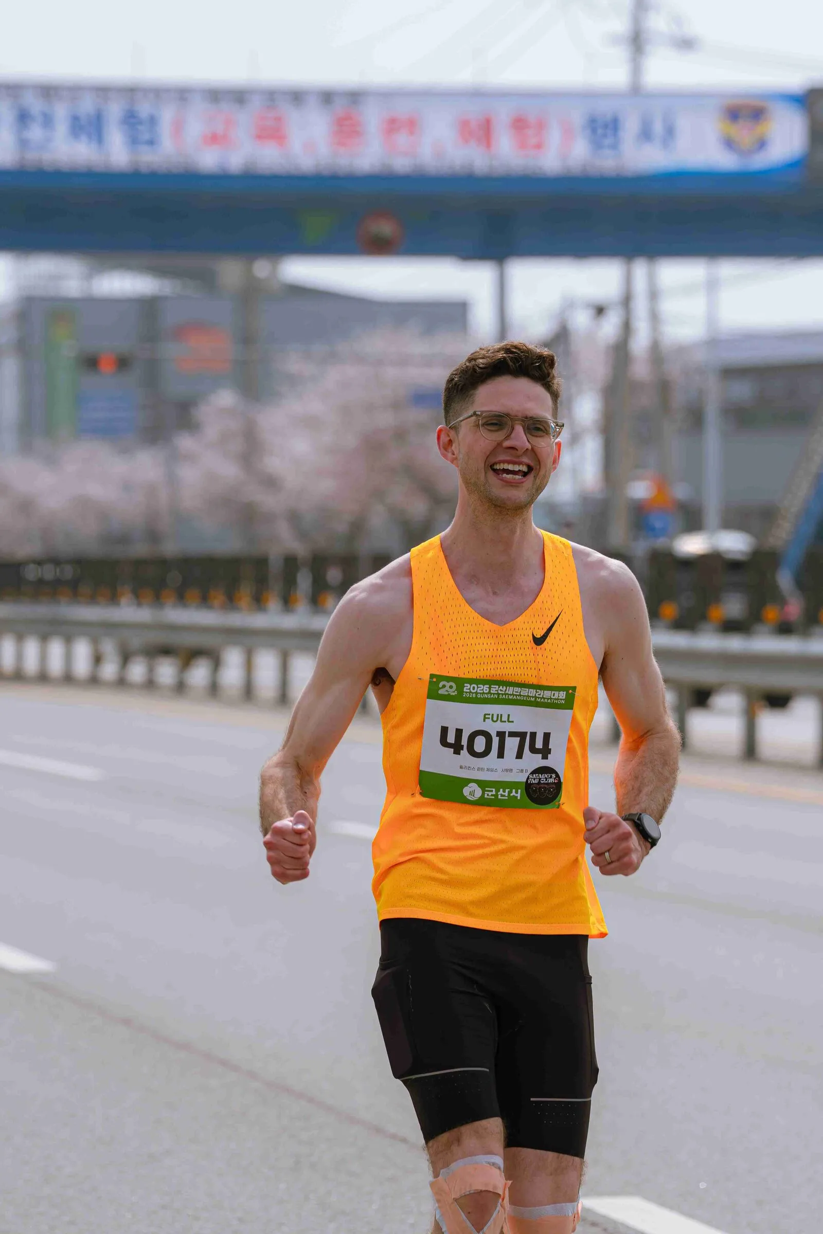 Quintin celebrating with a fist pump at the 2026 Gunsan marathon.