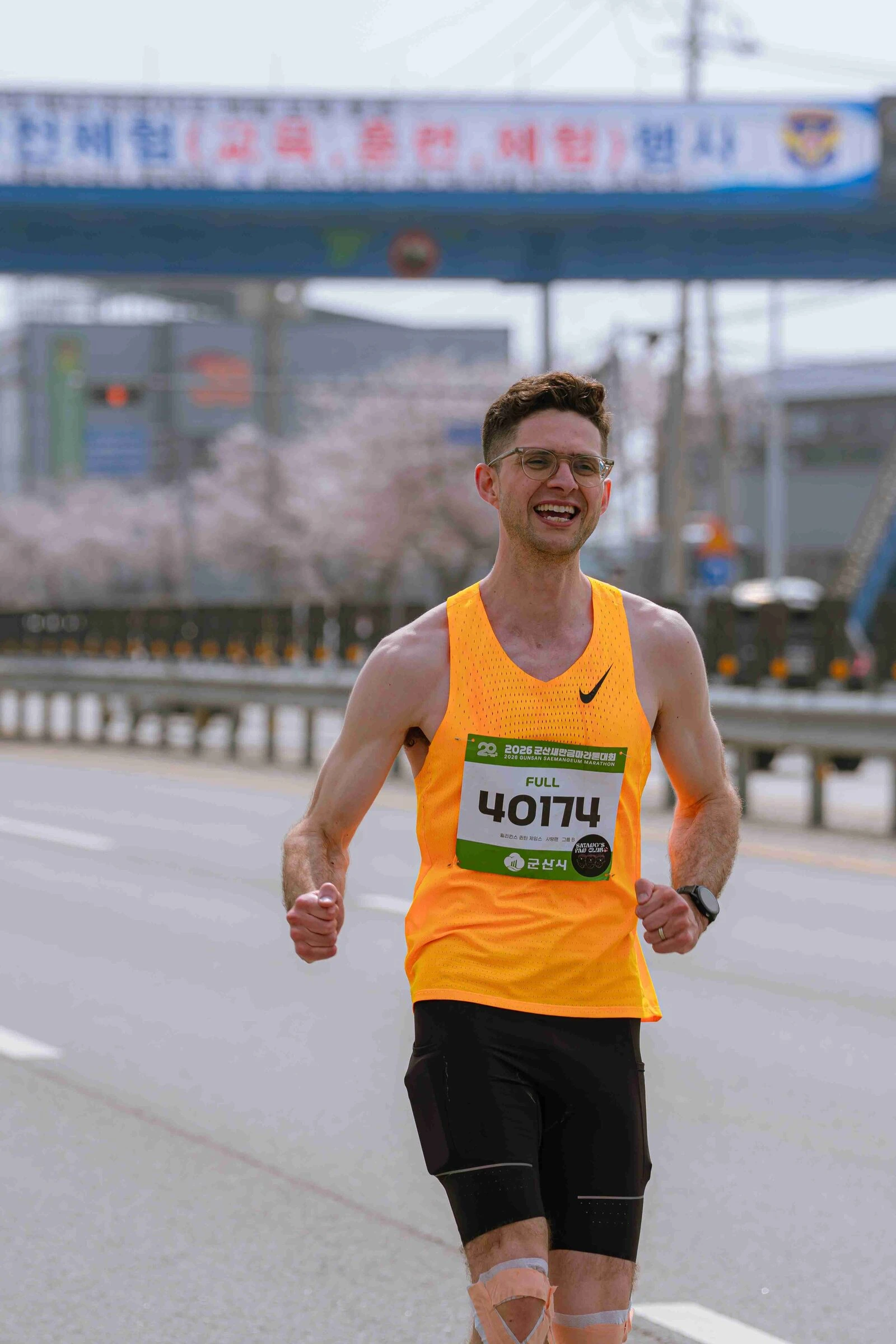 Quintin celebrating with a fist pump at the 2026 Gunsan marathon.