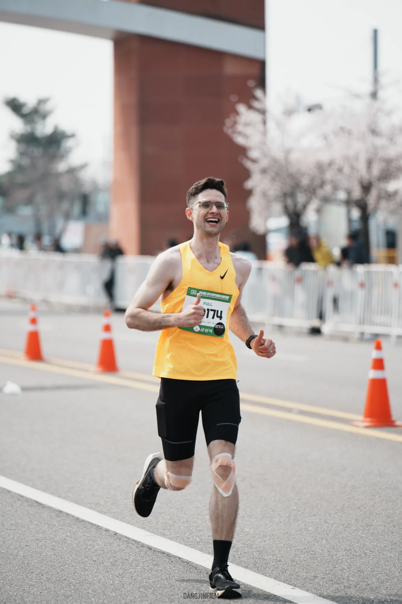 Quintin mid-stride at the 2026 Gunsan Saemangeum Marathon.