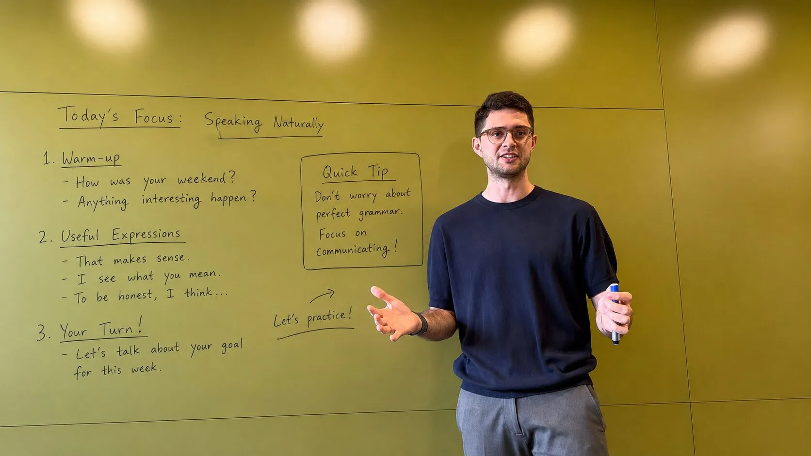 Quintin, a certified English teacher, leading a speaking lesson at the whiteboard in Seoul.
